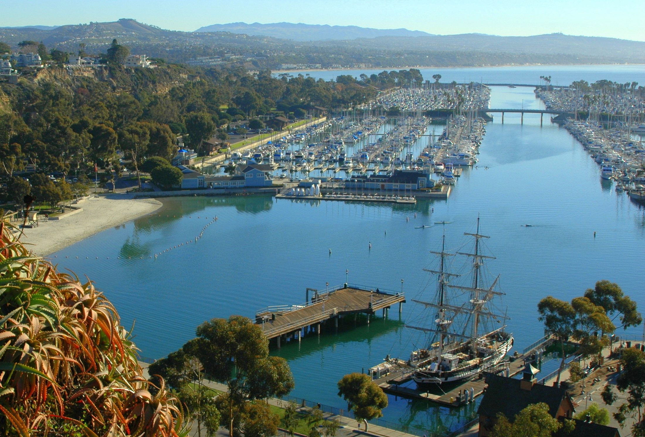 Dana Point Harbor with Baby Beach and the historic tall ship